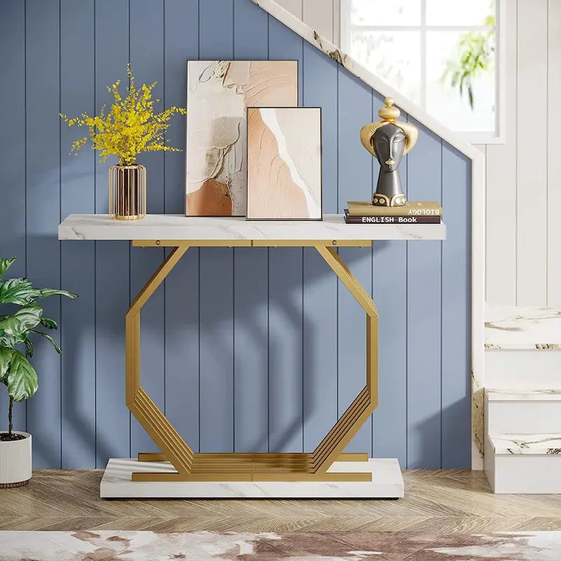Consolle oro/nero, ripiano effetto marmo, base geometrica in metallo, 101 cm