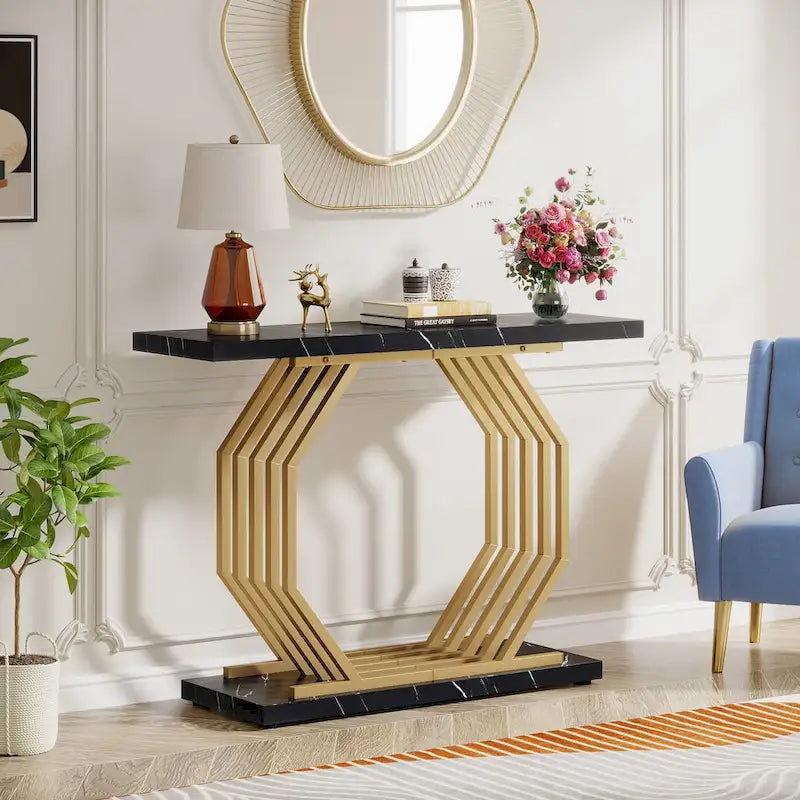 Consolle oro/nero, ripiano effetto marmo, base geometrica in metallo, 101 cm