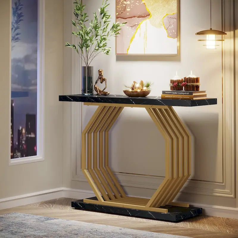 Consolle oro/nero, ripiano effetto marmo, base geometrica in metallo, 101 cm
