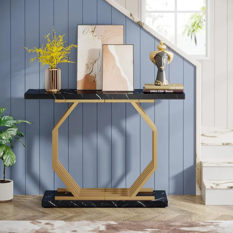 Consolle oro/nero, ripiano effetto marmo, base geometrica in metallo, 101 cm